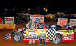 Ray Cook in Victory Lane with a $4,000 Payday for winning the Grand Adcox Memorial at the historic Cleveland Speedway in Tennessee, photo by Action Shots and Graphics