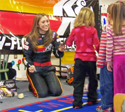 K&N Development Driver Caitlin Shaw also volunteers at children's hospitals and libraries when she is not volunteering in the classroom