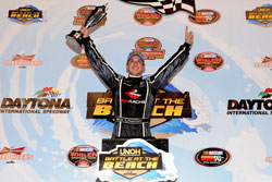 Daniel Suarez celebrates in victory lane after winning NASCAR K&N Pro Series East UNOH Battle at Daytona International Speedway