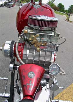 Custom motorcycle with K&N air filter on top of four barrel Holley carburetor
