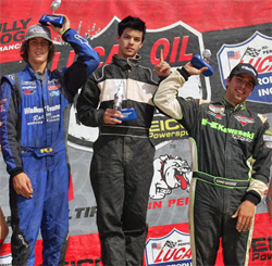 Riverside, California high school student RJ Anderson (left) on the podium after taking second place in LOORRS Race at SpeedWorld Off Road Park, courtesy of JnL Photo