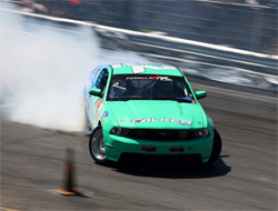 2010 Ford Mustang GT in a high speed battle for first place at Wall Speedway in New Jersey