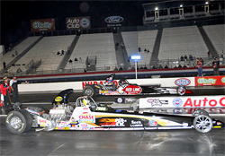 Greg Boutte took the win by half a car length over Rick Beckstrom in Super Comp at the NHRA Finals in Pomona, California, courtesy of Bob Johnson Photography