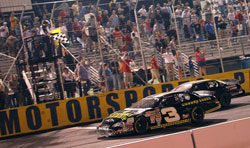 Ty Dillon and Cole Whitt battle it out on the track for the win.