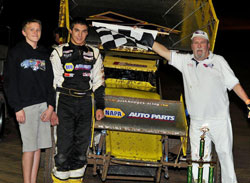 The win in Tucson marked the 16-year-old racers third career ASCS Regional win. Pictured next to Hodges is Troy Brubaker; he occasionally helps out when the team races in Tucson.