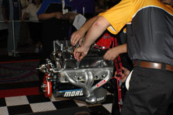 Students are in a race against the clock, as well as the other team, to correctly disassemble the engine. Then they must be reassembled to ready-to-run condition.