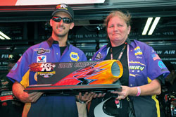 Vincent Noble and Peggy Coleman hold up the official K&N Horsepower Challenge Trophy