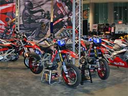 Factory Aprilia bikes on display at Long Beach Convention Center