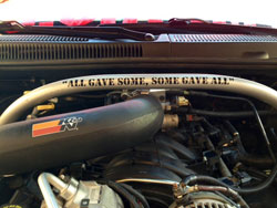 Directly above the K&N air intake system are the words "All Gave Some, Some Gave All"