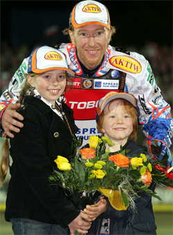 Australian Double World Speedway Champion celebrates victory in Poland with his two children, photo by Mike Patrick