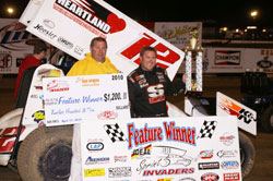 Hull visits victory lane for the 13th time in his career in Sprint Invader Association.  Hull is pictured in victory lane with 34 Raceway Promoter Jeff Laue. Photo by Dana Royer