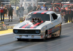 AA/FC National Champion John Hale racing the Nostalgia Funny Car series dragster wrapped in a 1969 Camaro body.