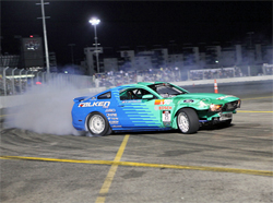 Vaughn Gittin Jr., returned to drift action at the Las Vegas Motor Speedway in his repaired 2010 Ford Mustang, photo by John Choi, provided by Falken Tires