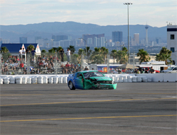 Track temperatures reached 145 degrees under the hot desert sun when Vaughn Gittin Jr., hit the wall in his 2010 Ford Mustang, photo by John Choi, provided by Falken Tires