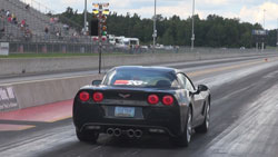 Fisher's K&N Corvette trading the curves of the highways for the quarter-mile where it can let it all hang out for some fun time slips.  