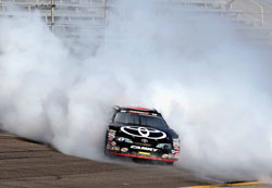 Kyle Larson lights the tires up in celebration after winning the 2012 Pro Series East Chamionship