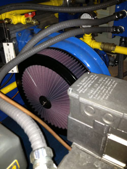 Ron D.R. Laing unconventional use of a K&N air filter has reduced maintenance and improved the life of their washer/blower system by more than 50%.