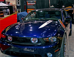 2010 Ford Mustang GT with a 4.6 liter supercharged engine in the Procharger booth at the SEMA Show in Las Vegas, Nevada