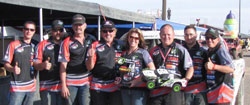 The Live Fast Play Dirty Motorsports crew celebrates their momentum making podium finish at Wild Horse Motorsports Park.