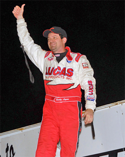 Ricky Logan took home a trophy, a check, half an pig and half a cow after winning a sprint car race during the Marion County Fair in Knoxville, Iowa, photo by DaveHillsRacingImages.com