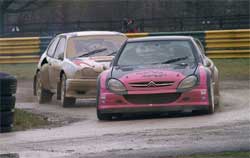Mad Mark driving red car in A Final