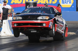 Mark Faul drives a 1998 Pontiac Grand Am in Super Stock Racing