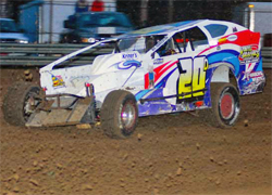 Heavy Rain turned Mercer Raceway Park into a rough track where Del Rougeux hit a rut and had to pit for repairs, photo by Oyler Action Photo