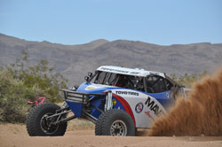Scott Bailey kicking up dust in his off-road buggy.