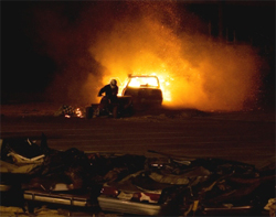 Black Stallion Driver Michael Vaters destroys a junk car with a Kamikaze Jet Powered 4-Wheeler during Monster Truck action