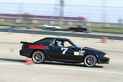 Mike Morrow pushing that newly updated Fox Body Mustang at Hotchkis Cup Autocross Challenge