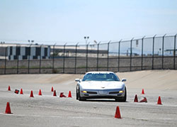 Mary Pozzi in her Corvette, affectionately named Trouble at Hotchkis Cup Autocross Challenge