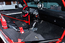 Paul Summers 1972 Chevy Nova with LS7 and Black and red Kirkey race seats adorn the interior with G-Forge 5-point seat belts and an Art Morrison cage