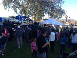 The Shocker Monster truck team helped pass out gifts and sign autographs