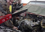 Getting ready to remove the engine of Major Jeffrey Calero's Pontiac GTO