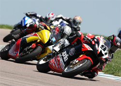 Riders Chaz Davies and Aaron Gobert work it out on the Aprilia RSV1000Rs in AMA Daytona SportBike Series Race