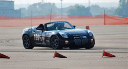 Driving his Pontiac Solstice Ryan Buetzer won the 2011 SCCA C-Stock National Championship, his sixth title in just eight years.