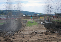 Mud Racers in heads-up action take on a 200 foot course in seconds, photo by Sue Potter