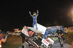 Giovanni Scelzi celebrating a win on top of his Sprint Car at Jr. Sprints