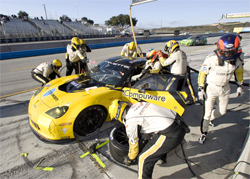 Corvette Racing pit crew works on Corvette C6.R at Mazda Raceway Laguna Seca in Monterey, California, photo by GM Corp.