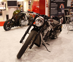 Roland Sands custom bike and futuristic V-REX by Travertson in K&N booth at SEMA show