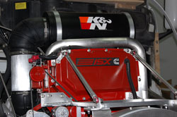 Shown here on top of the Cummins ISX is the new air induction system, and the new Heavy Duty Air Filter assembly from K&N Filters.