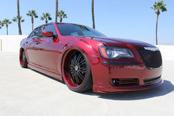 Late model, custom paint, big wheels, engine mods equates to 2012 SEMA worthy Chrysler 300
