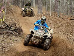 Michael Swift attacks the trail on his Polaris UTV with Kevin Trantham close on his heels