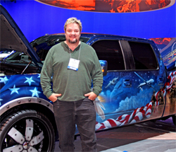 Artist Mickey Harris created a series of murals over the dark blue 2009 Ford F-150 to honor American soldiers.