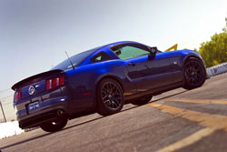 2010 Mustang RTR is equipped with an RTR rear diffuser, front splitter, aluminum rear spoiler, RTR side and rear emblems, as well as a distinctive RTR vinyl scheme