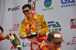 Zhu Xun celebrated his third place podium finish in the Xi Delong Cup 2010, but kept things in perspective by his belief that in racing, as in life, the journey is the thing.