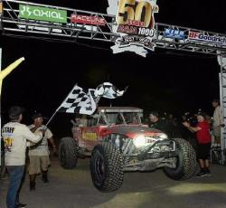 Adler and Team 4 Wheel Parts at the checkered flag of the Baja 1000
