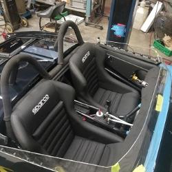 Custom narrow Sparco vintage style seats were installed in the snug confines of the Bugeye's coc