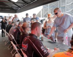 drivers meet fans and sign autographs at the K&N display trailer