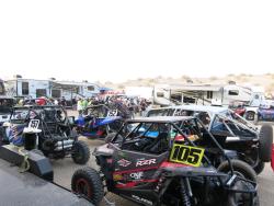 UTV race machines parked at a pre-race BBQ in the UTVWC pits